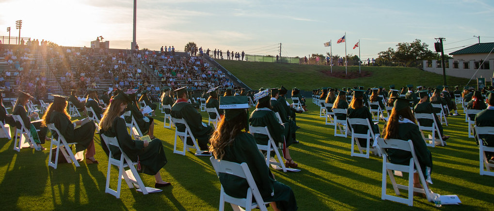 crowd of graduates at commencement